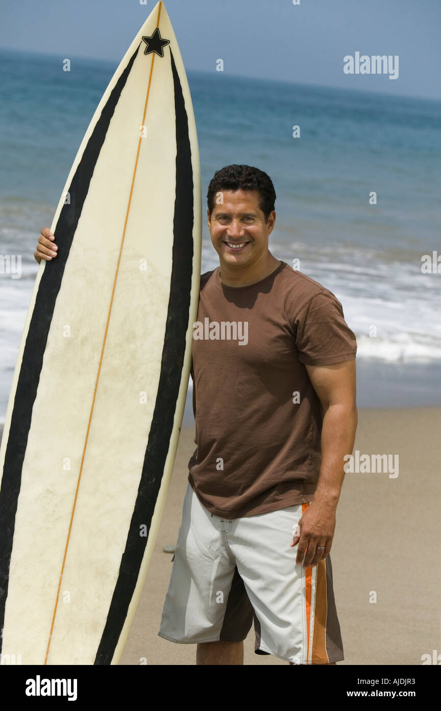 Hispanic surfer man holding hi-res stock photography and images - Alamy