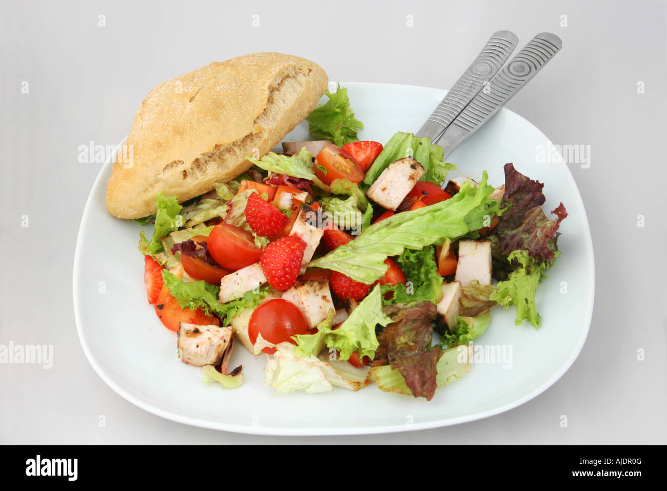 a dish of ready to eat chicken salad with bread Stock Photo
