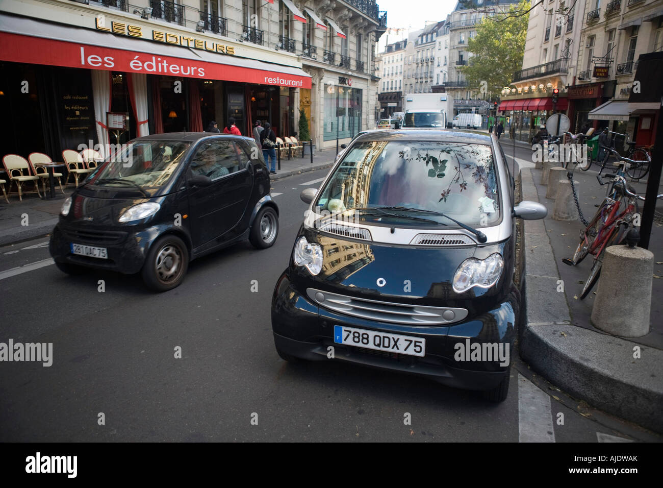 Small,easy to park micro,mini,car,cars, parked in limited space along Rue  St Honore, a fashionable,up-market shopping street in centre, 1,Paris Stock  Photo - Alamy