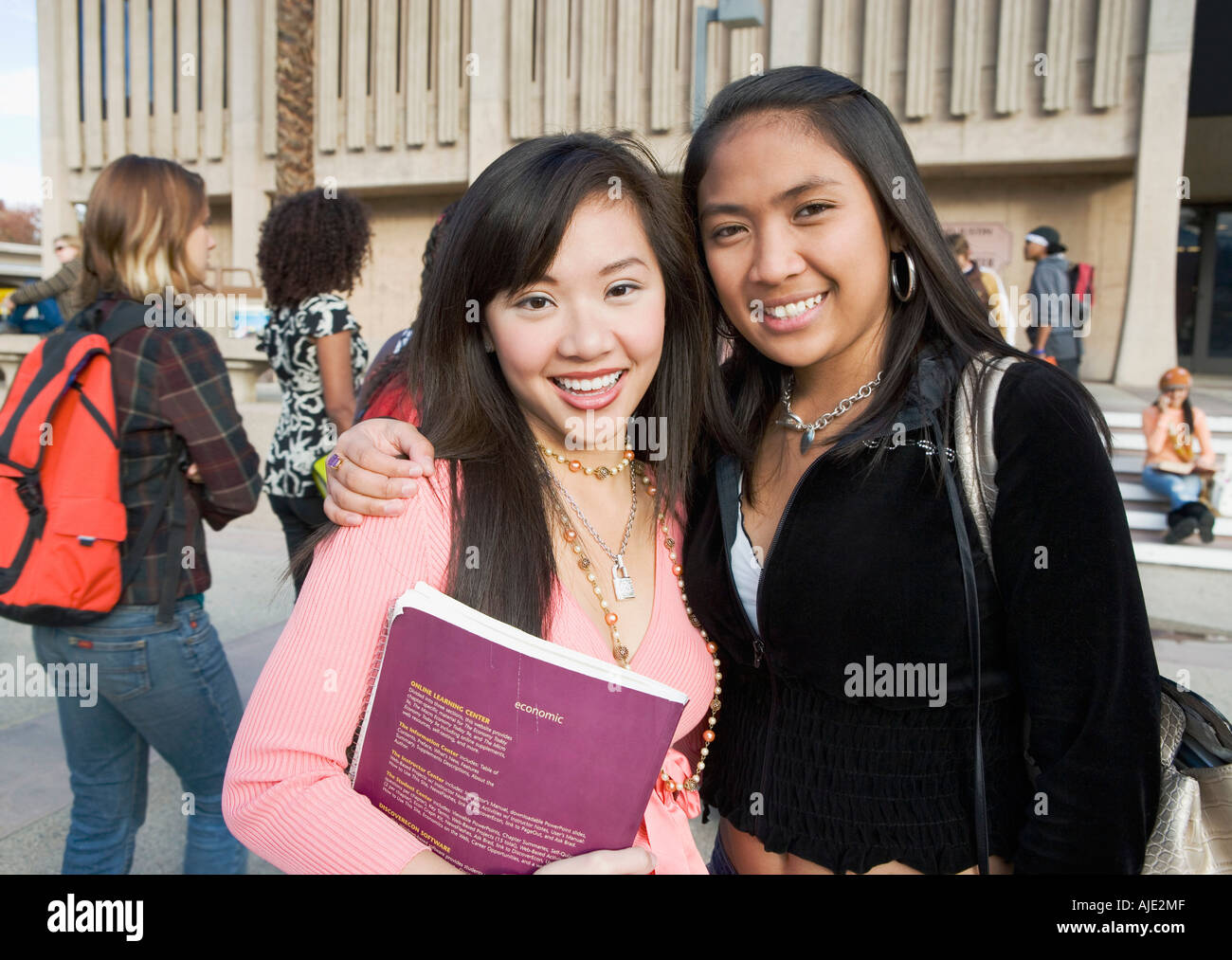 Two female students outside school, (portrait) Stock Photo