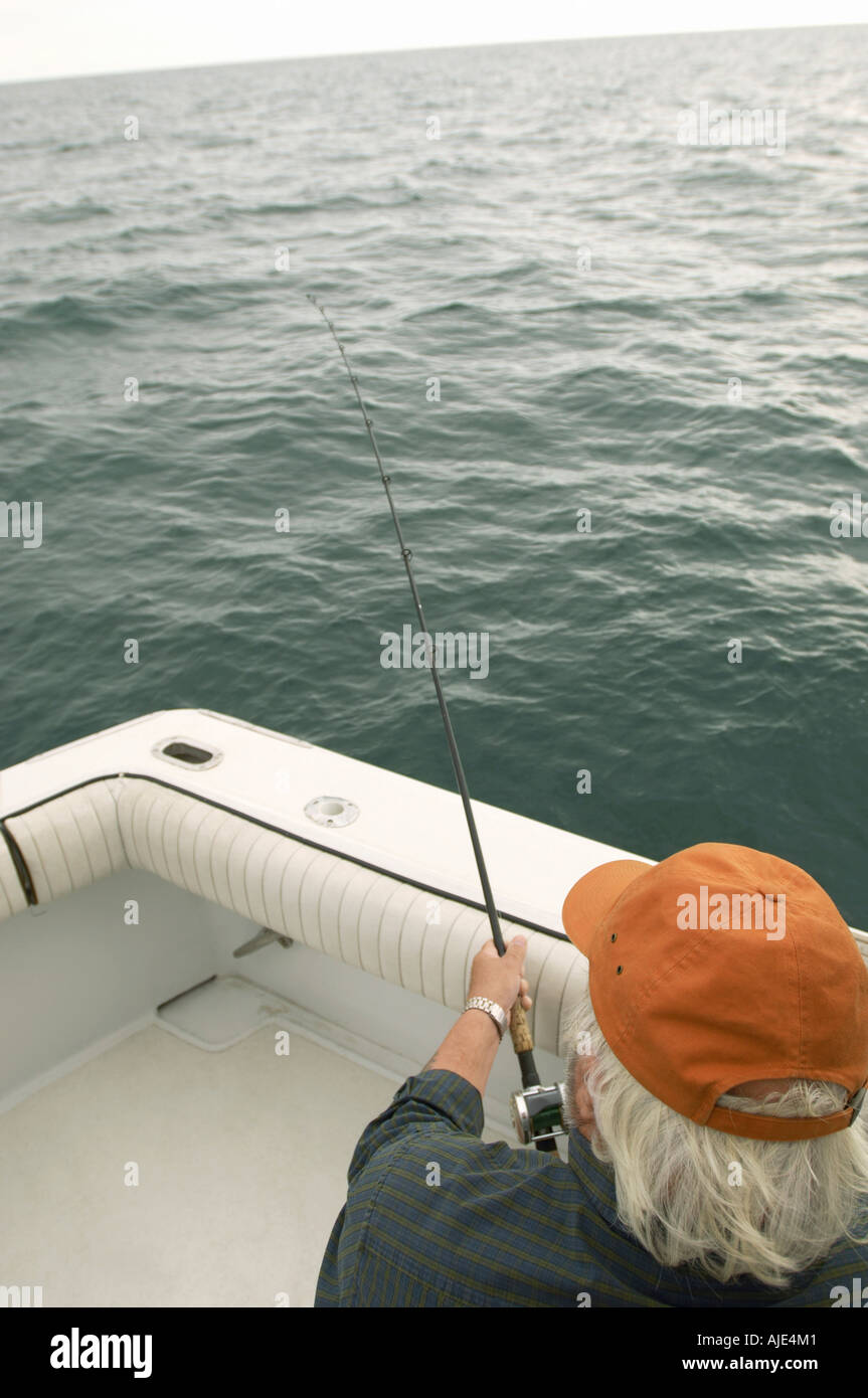 Fisherman in boat sailing on hi-res stock photography and images - Alamy