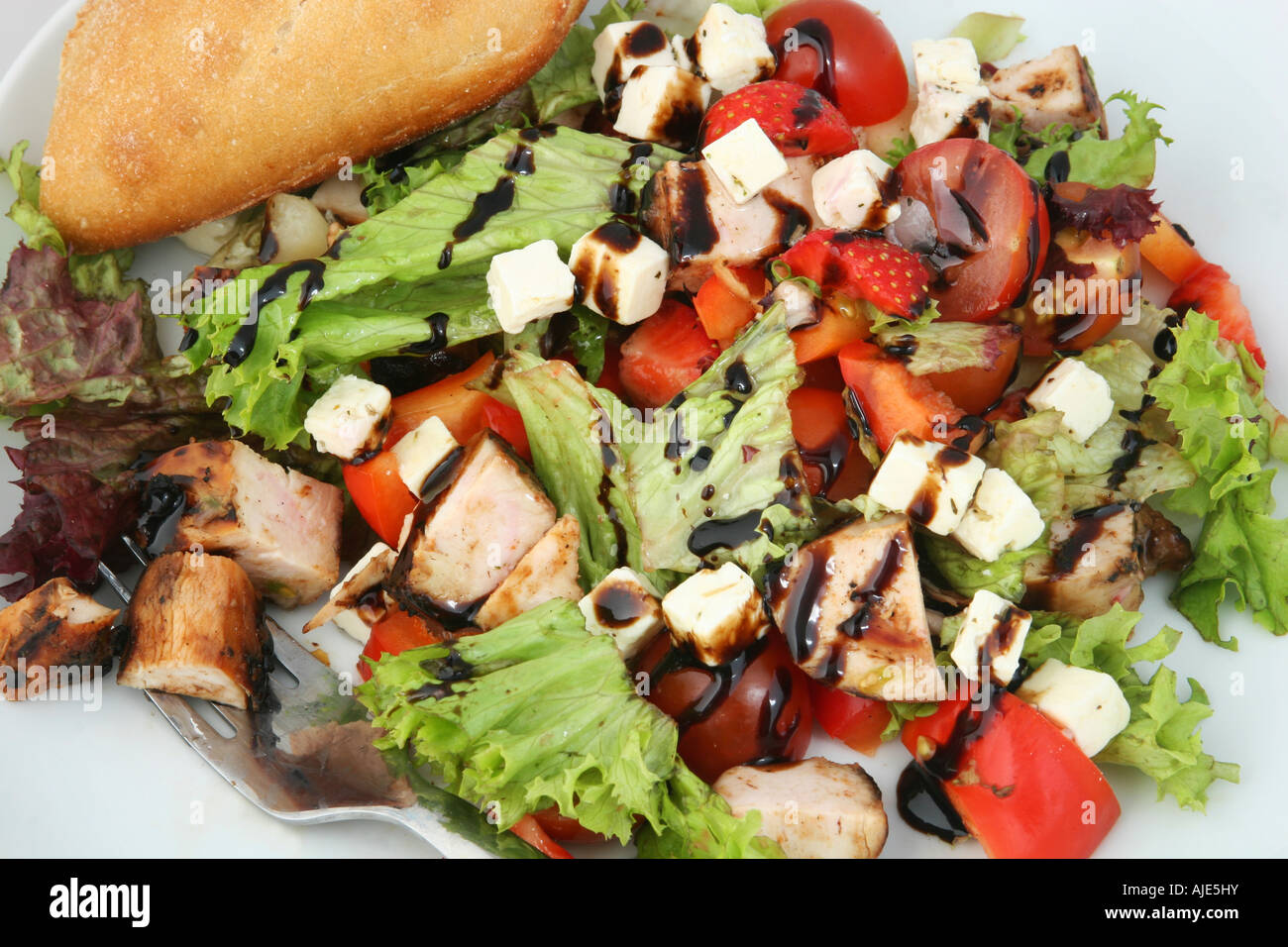 a dish of ready to eat chicken salad with bread Stock Photo
