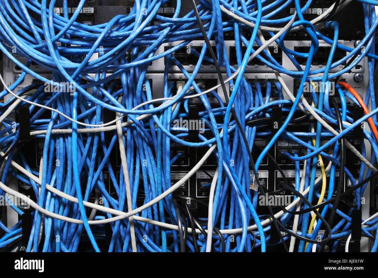 chaotic mess of network cables all tangled together Stock Photo Alamy