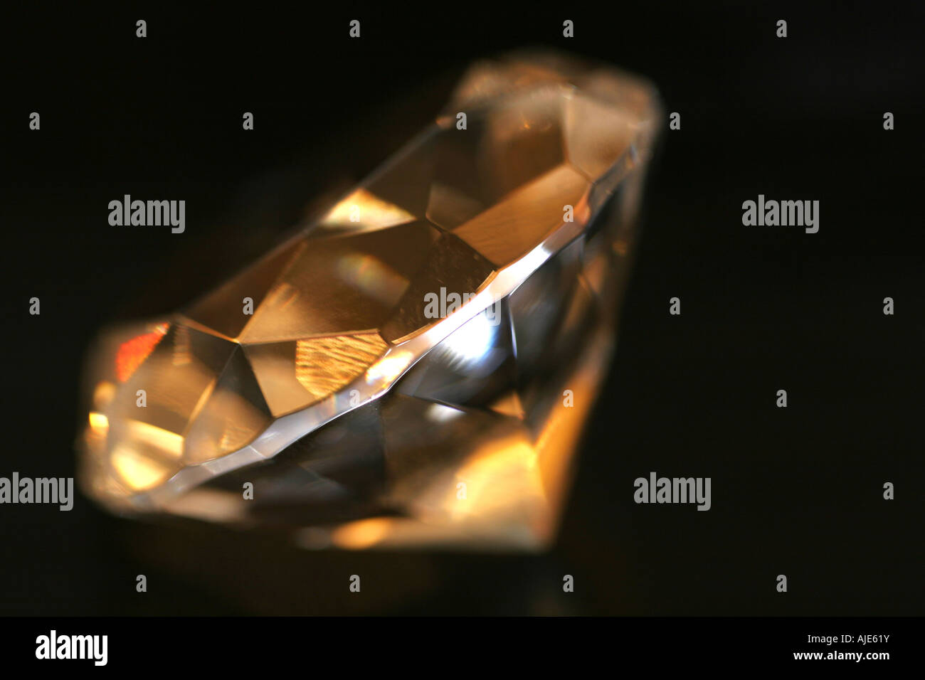 A clear diamond isolated on black Stock Photo Alamy