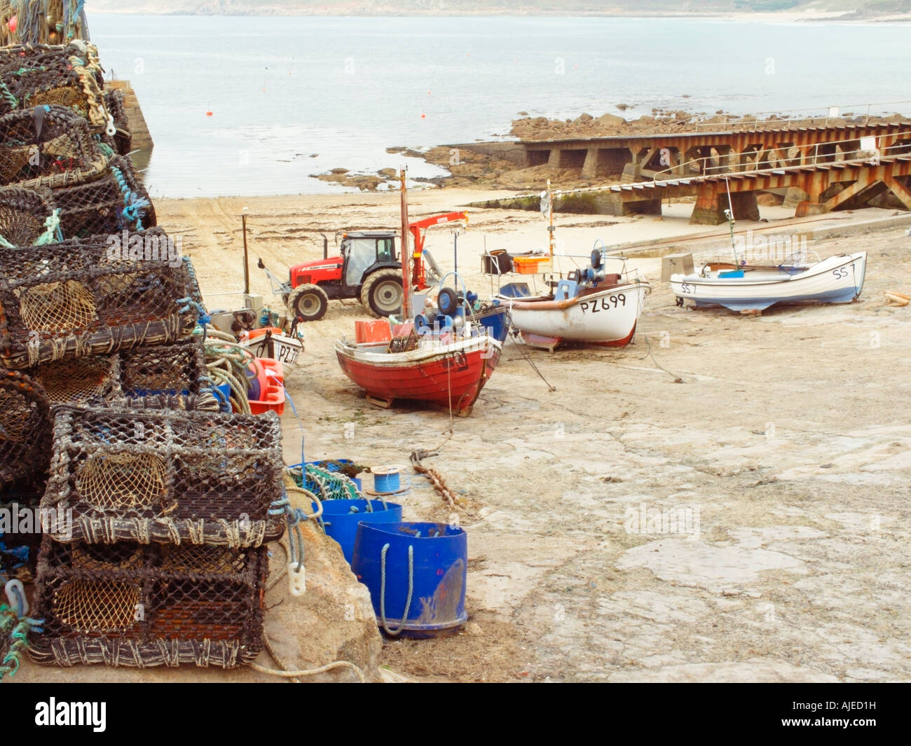 Crab and Lobster Pots with Fishing Boats on the slipway Sennen Cove ...