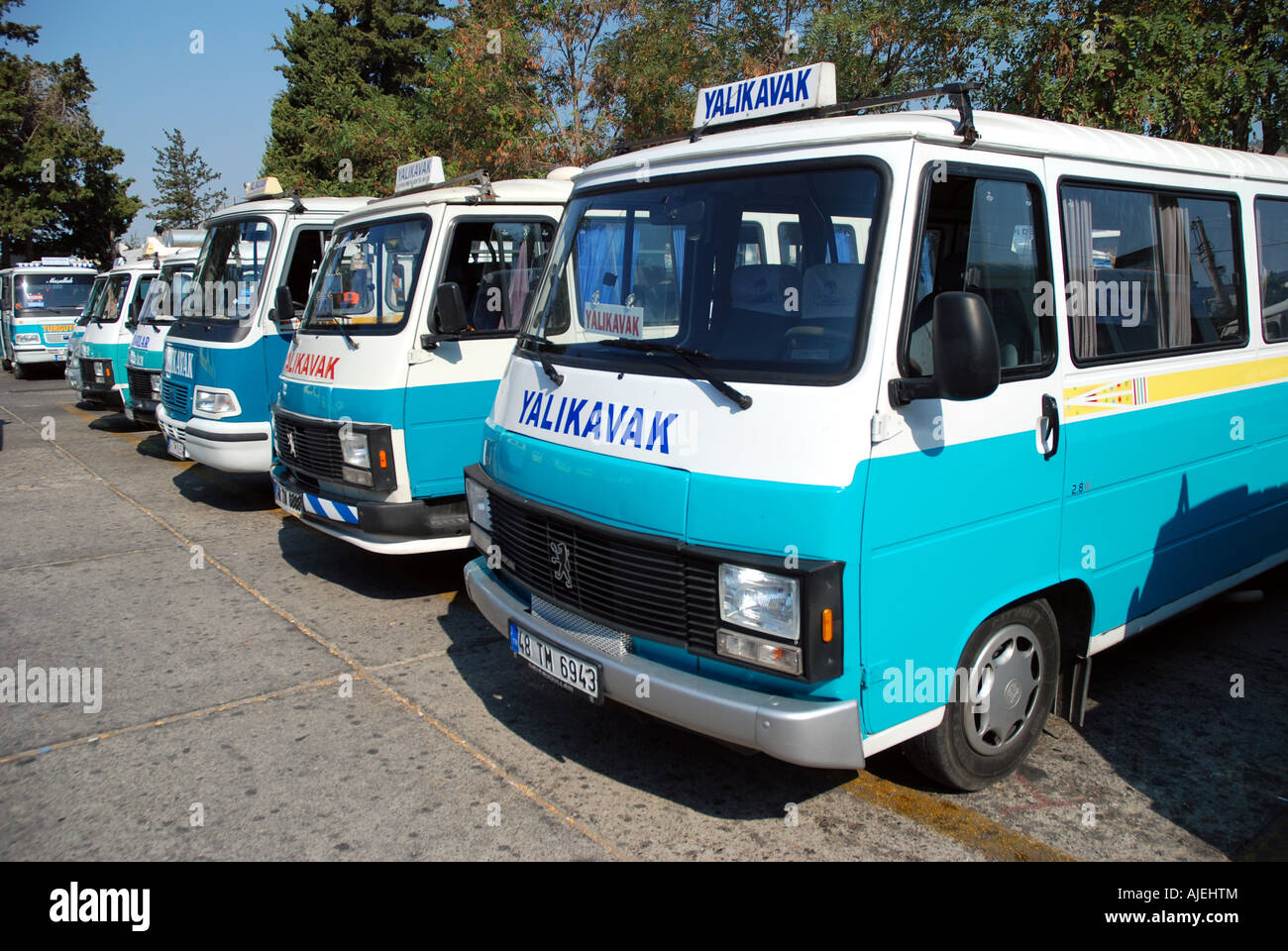 Typical turkish small buses called dolmus in Bodrum City, most popular  transport vehicle in Turkey, cheap and regular Stock Photo - Alamy