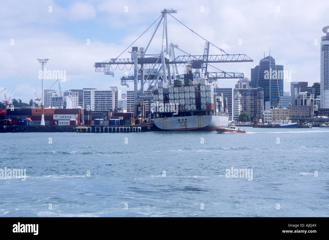 Cargo ship unloading in Auckland Harbour New Zealand Stock Photo Alamy