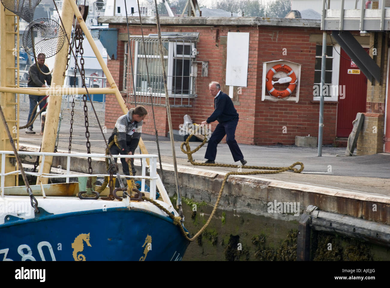 Fishing ship mooring quay side Stock Photo Alamy