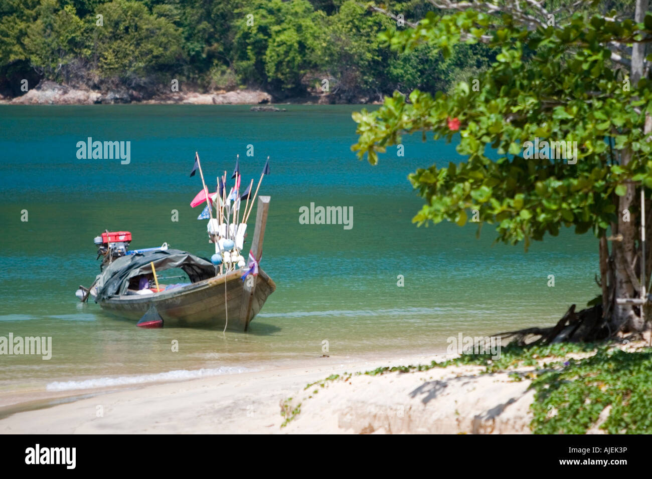 Traditional longtail boat with markers and floats Ko Phayyam island