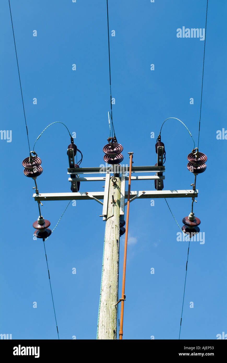 electricity pylon with blue sky Stock Photo - Alamy