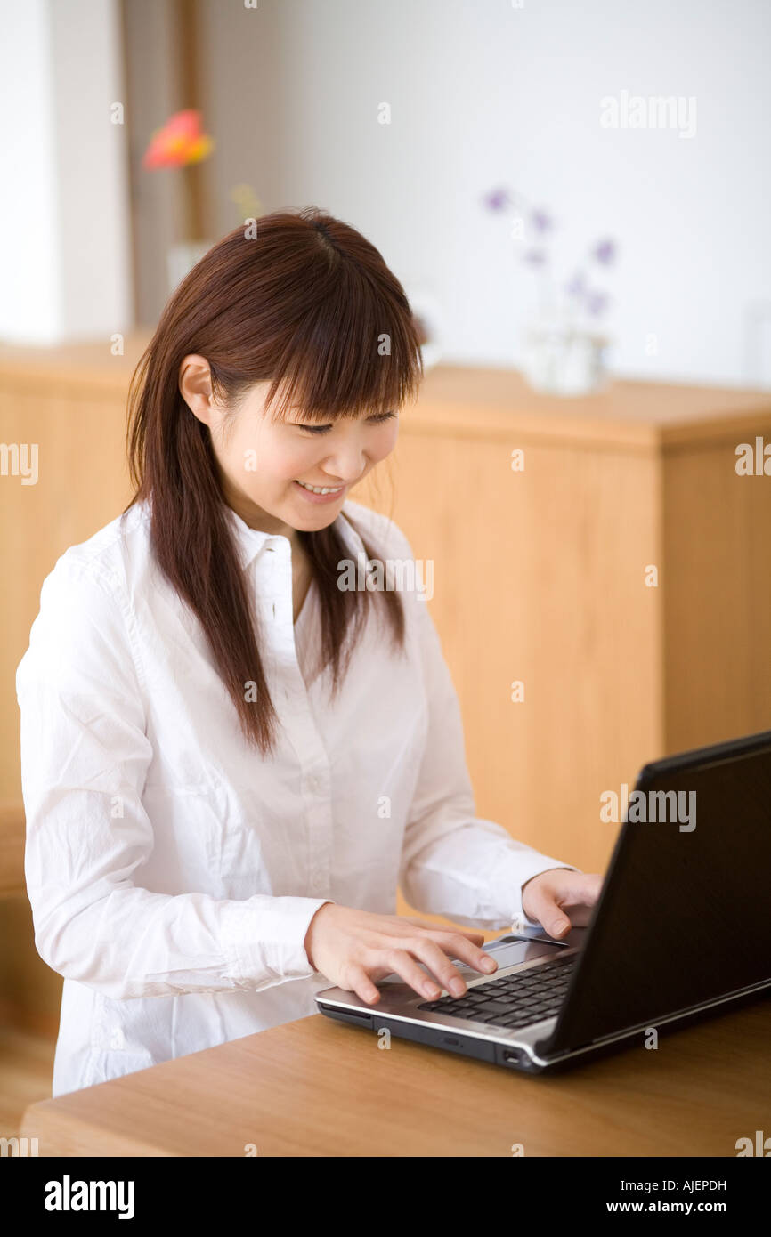 Woman Using Computer Stock Image Woman at computer hi-res stock photography and images - Alamy