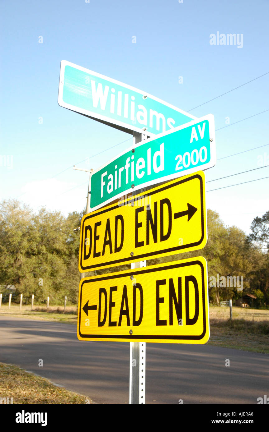 Dead End signs pointing both ways to Dead End of streets in FL Stock Photo