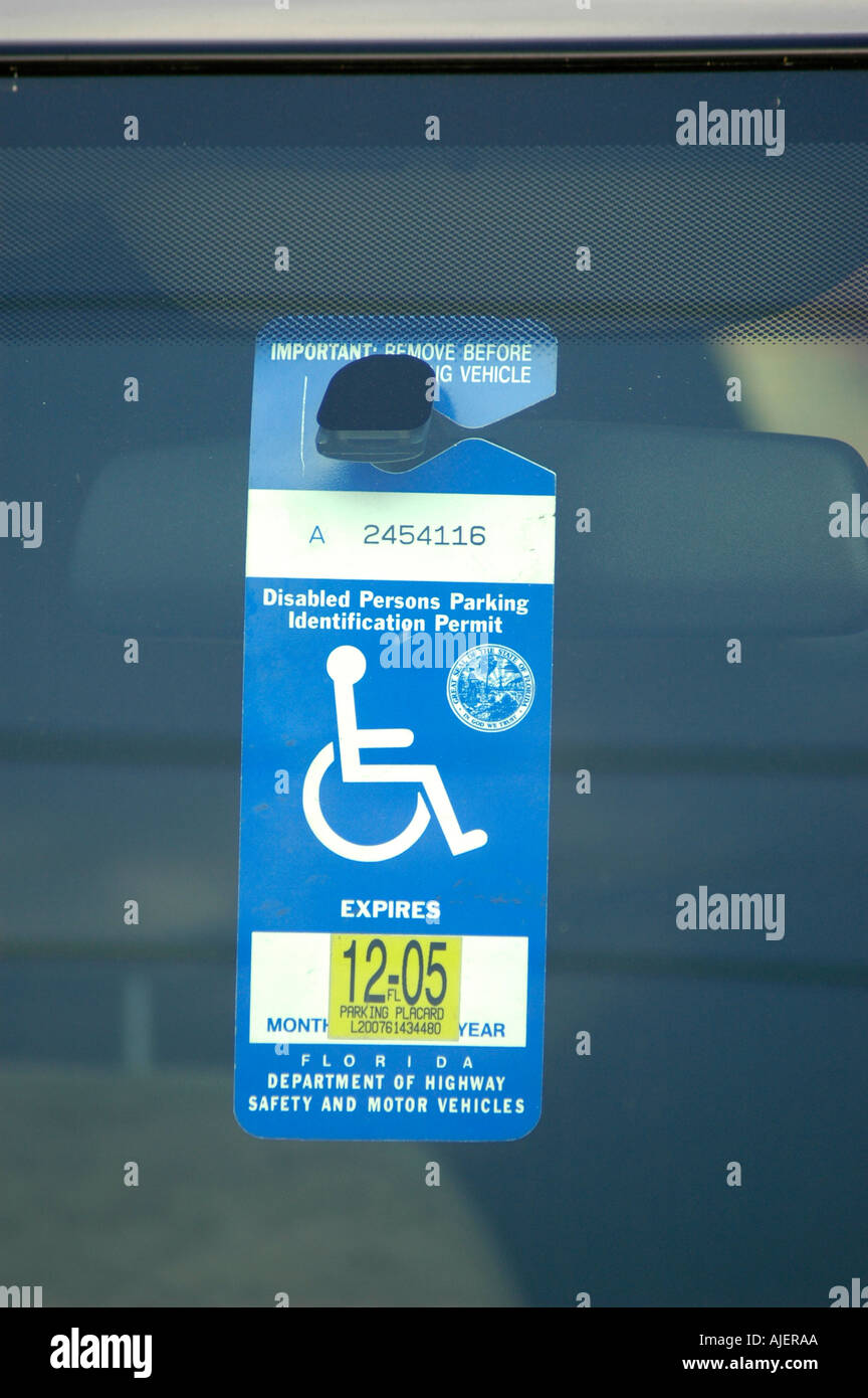 Handicapped sign in car window for access to parking spots for disabled persons Stock Photo Alamy