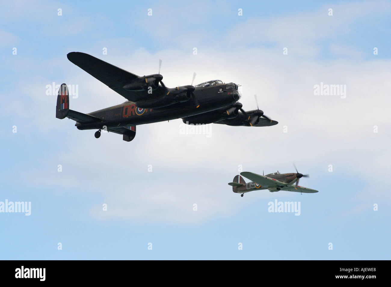 Lancaster world war 2 bomber and hurricane wwII fighter plane Displaying at Eastbourn airshow Stock Photo