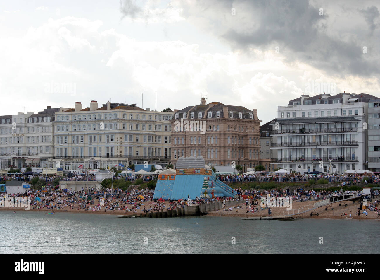 Eastbourne beach Busy seafront in Sussex England Seaside resort for holiday makers in England Stock Photo