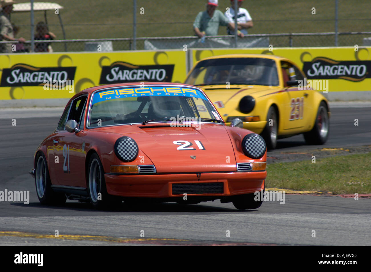 Ed Leed in his 1969 Porsche 911S is followed by the 1969 Porsche 911 of David Bland at the 2006 Kohler International Challenge Stock Photo