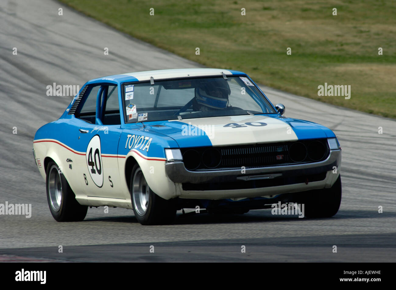 Lisa Weinberger races her ex-Janet Guthrie 1972 Toyota Celica GT at the 2006 Kohler International Challenge with Brian Redman Stock Photo