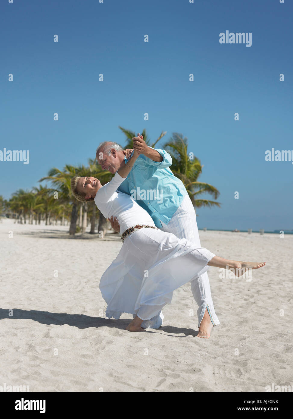Woman dancing barefoot on sand hi-res stock photography and images - Alamy