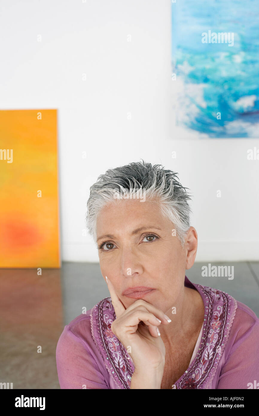 Woman in art gallery, portrait Stock Photo - Alamy