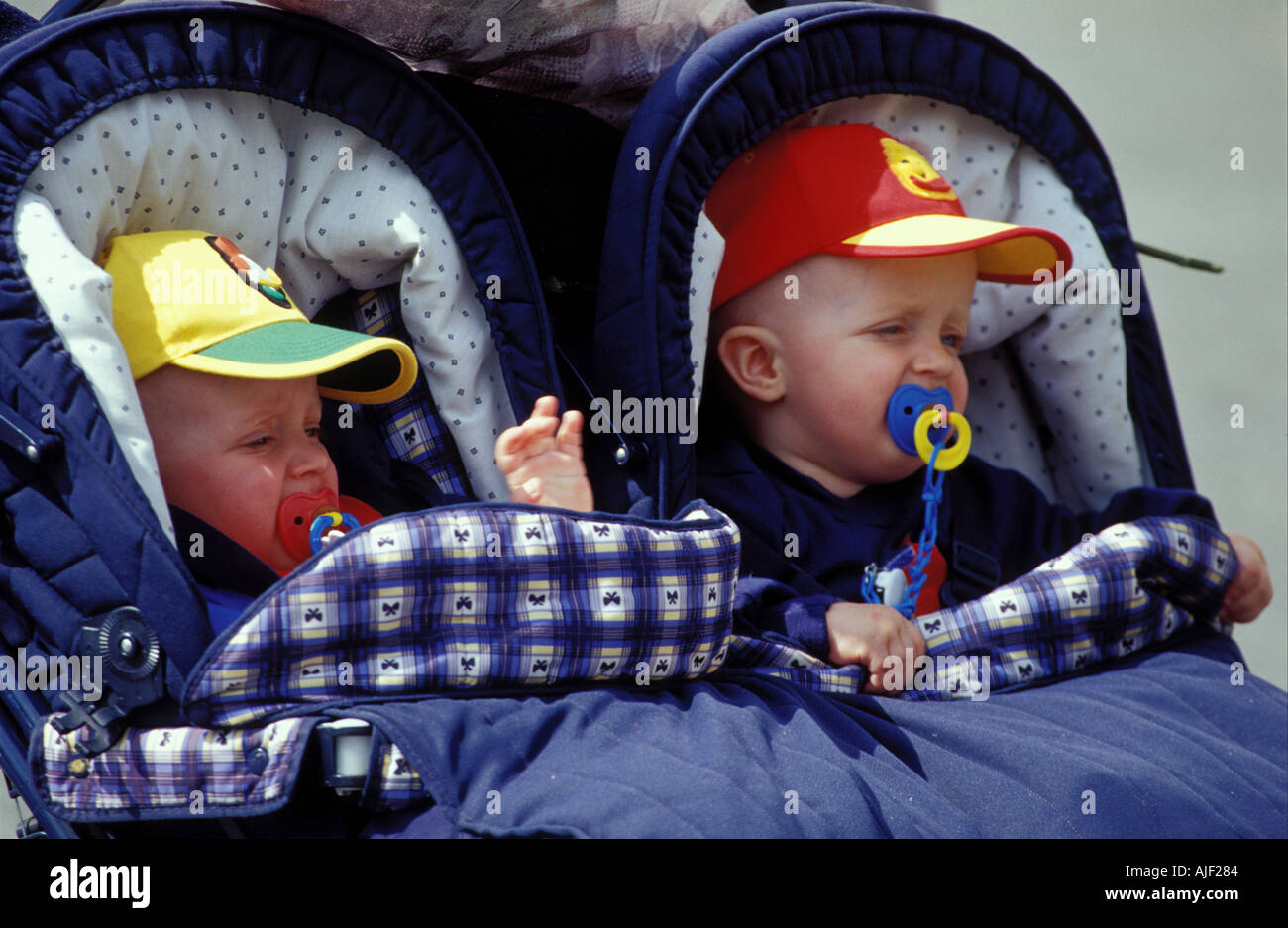 Twins in pram children Stock Photo Alamy