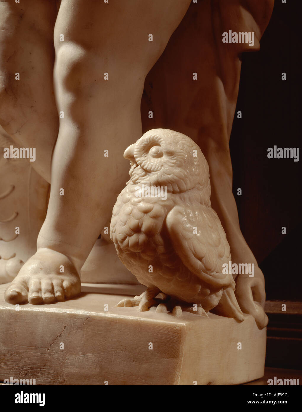 Detail of owl at the base of a marble statue of a cherub in the Long Gallery at Powis Castle Powys Wales Stock Photo