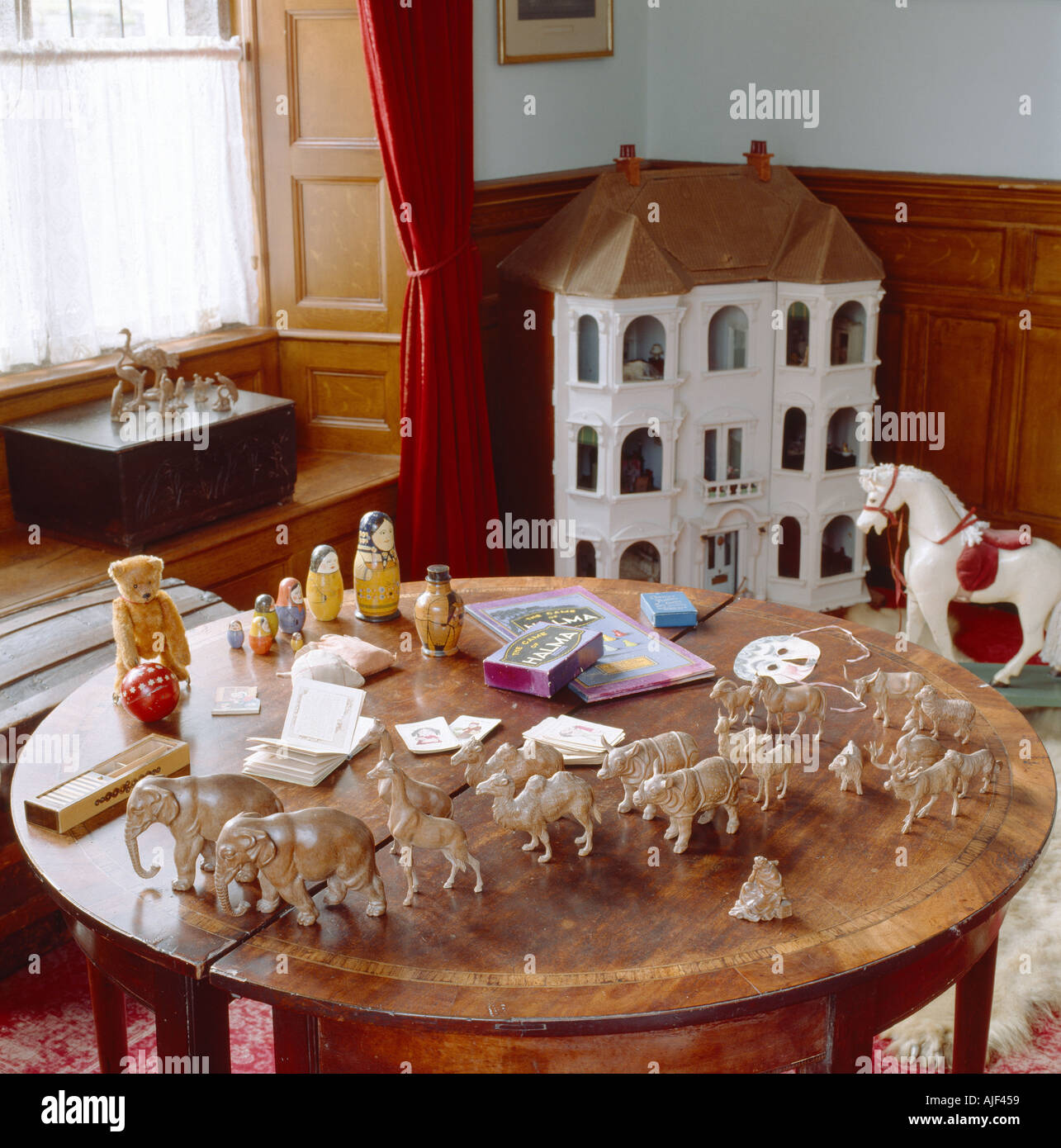 Table detail showing the Swiss noahs ark animals in the Day Nursery at Lanhydrock Cornwall Stock Photo