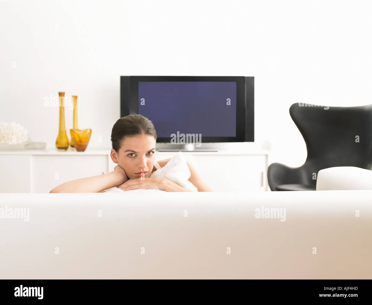 Lifestyle woman on sofa luxury hi-res stock photography and images - Alamy