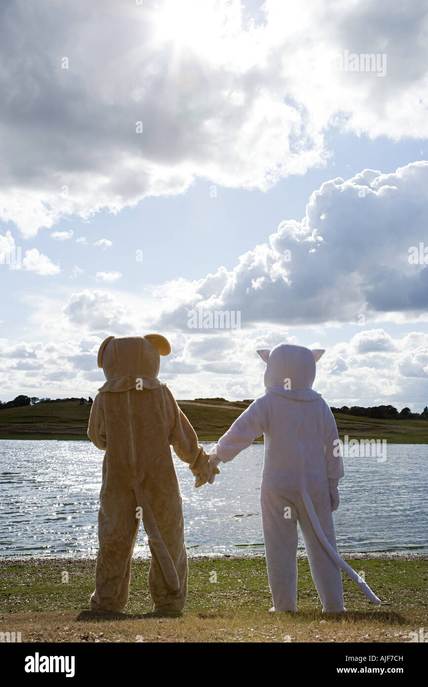 People in costumes by lake Stock Photo
