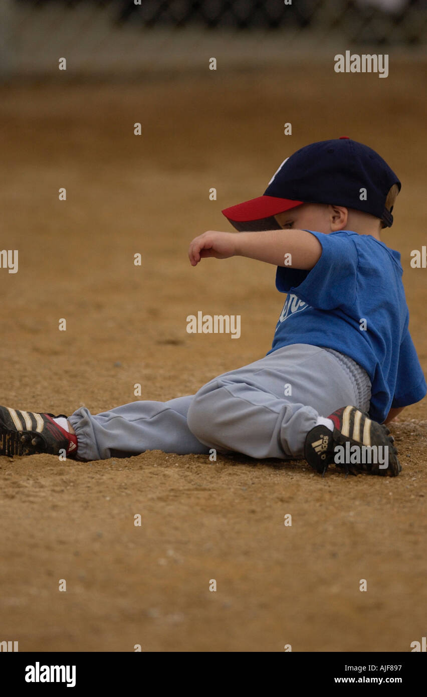 Toddler slides into home plate at a youth baseball game Stock Photo Alamy
