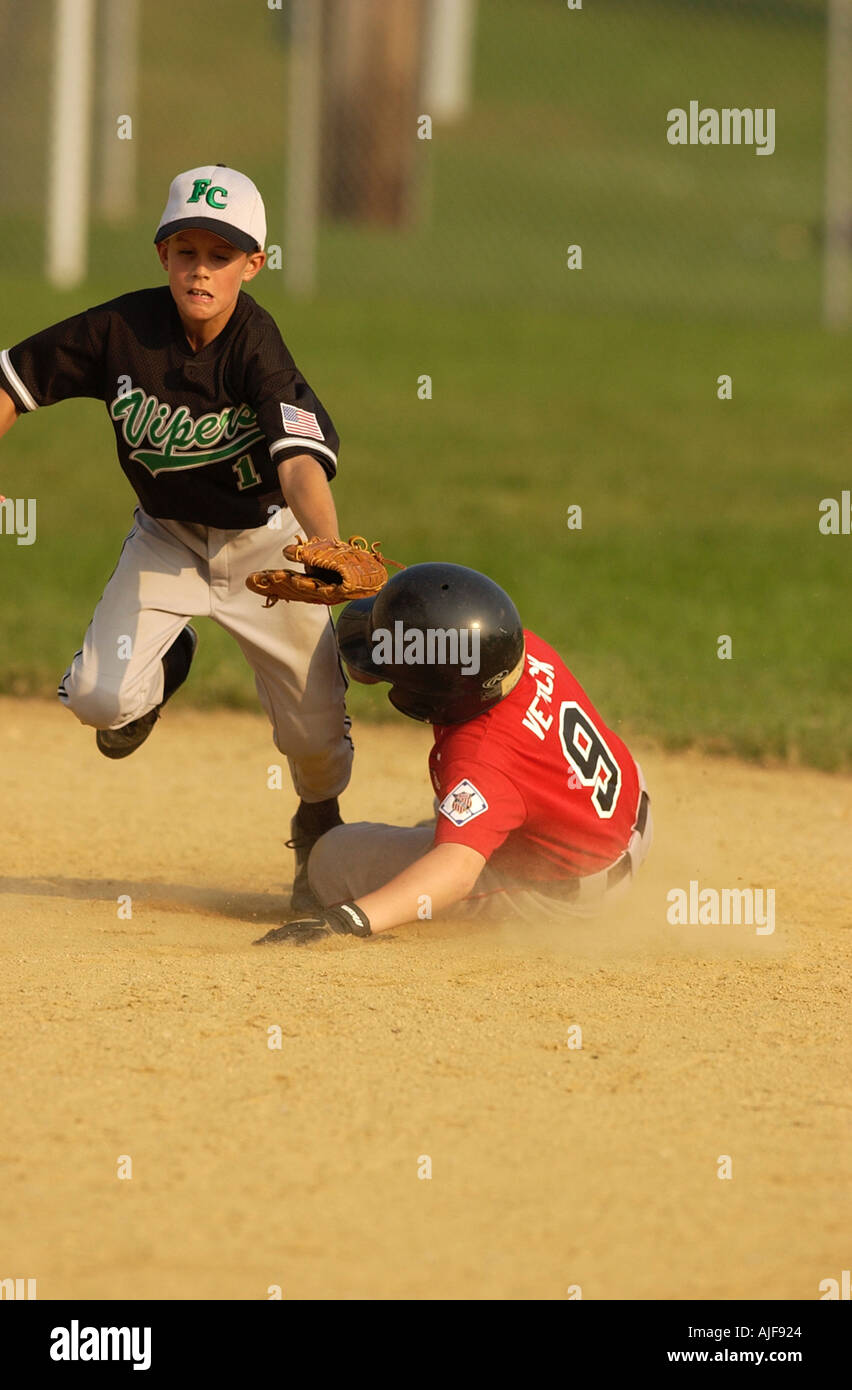 Youth baseball action Stock Photo - Alamy