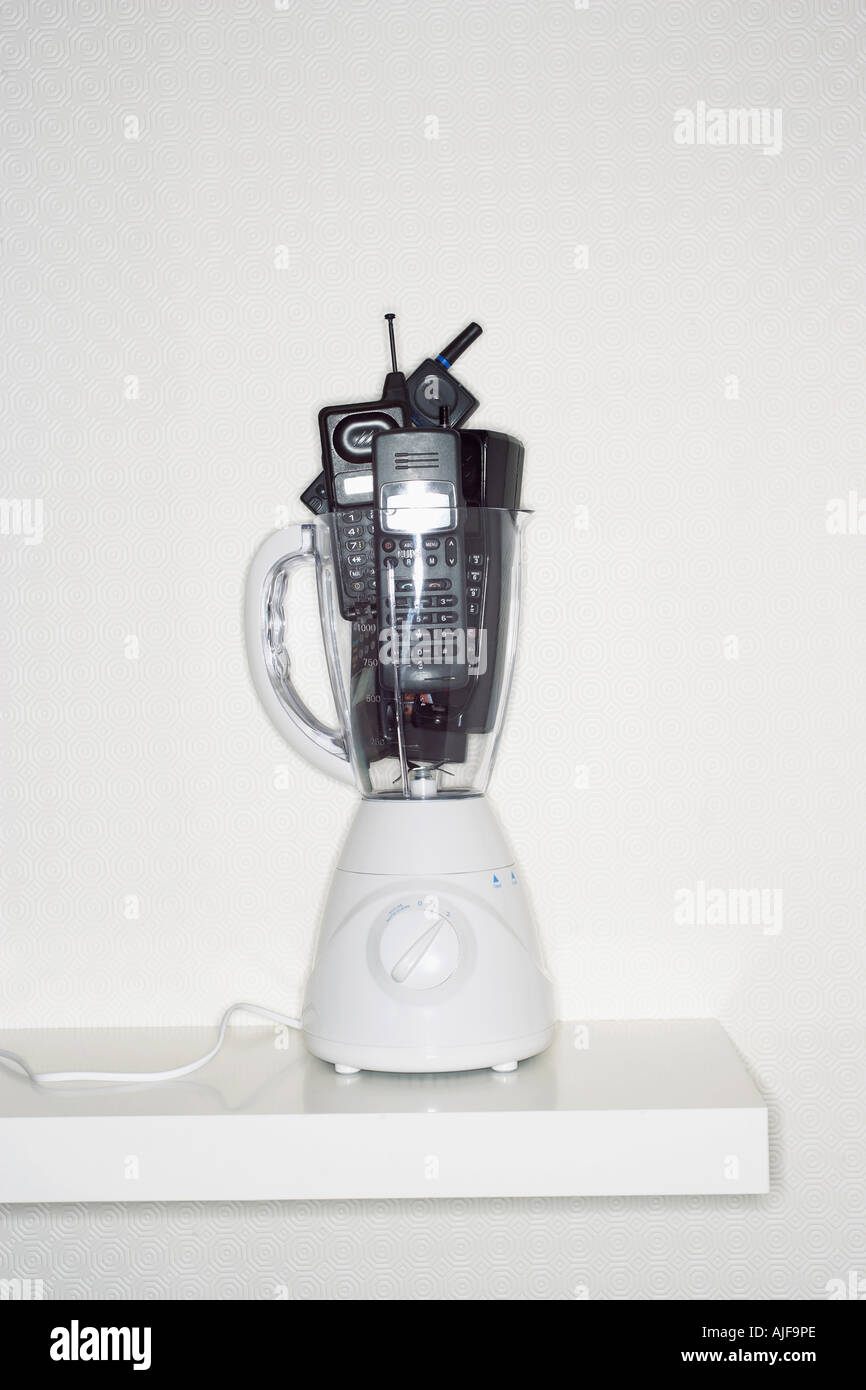Mobile phones in electric blender Stock Photo Alamy