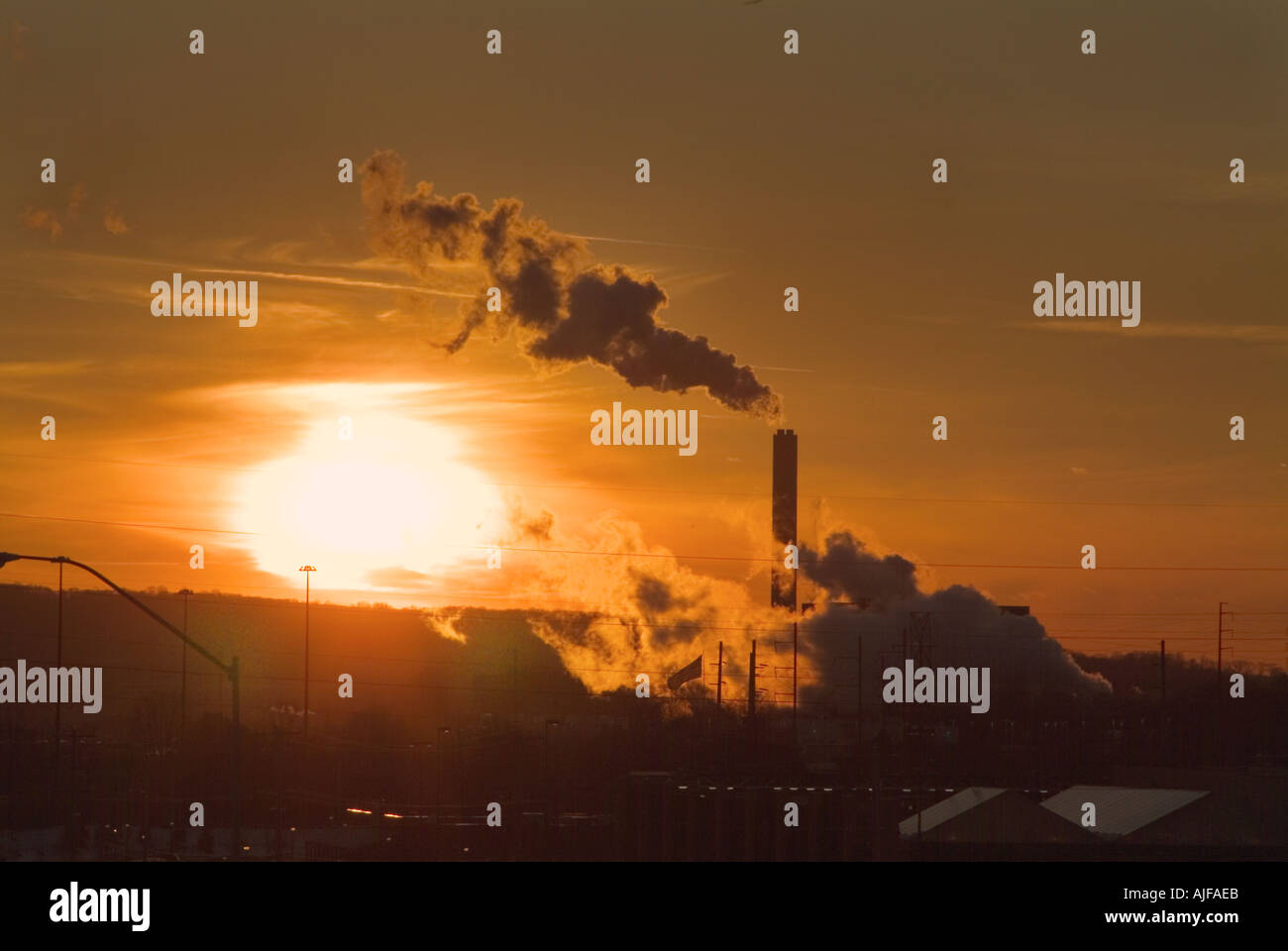 Industrial Pollution With Sunrise, Delaware, USA Stock Photo