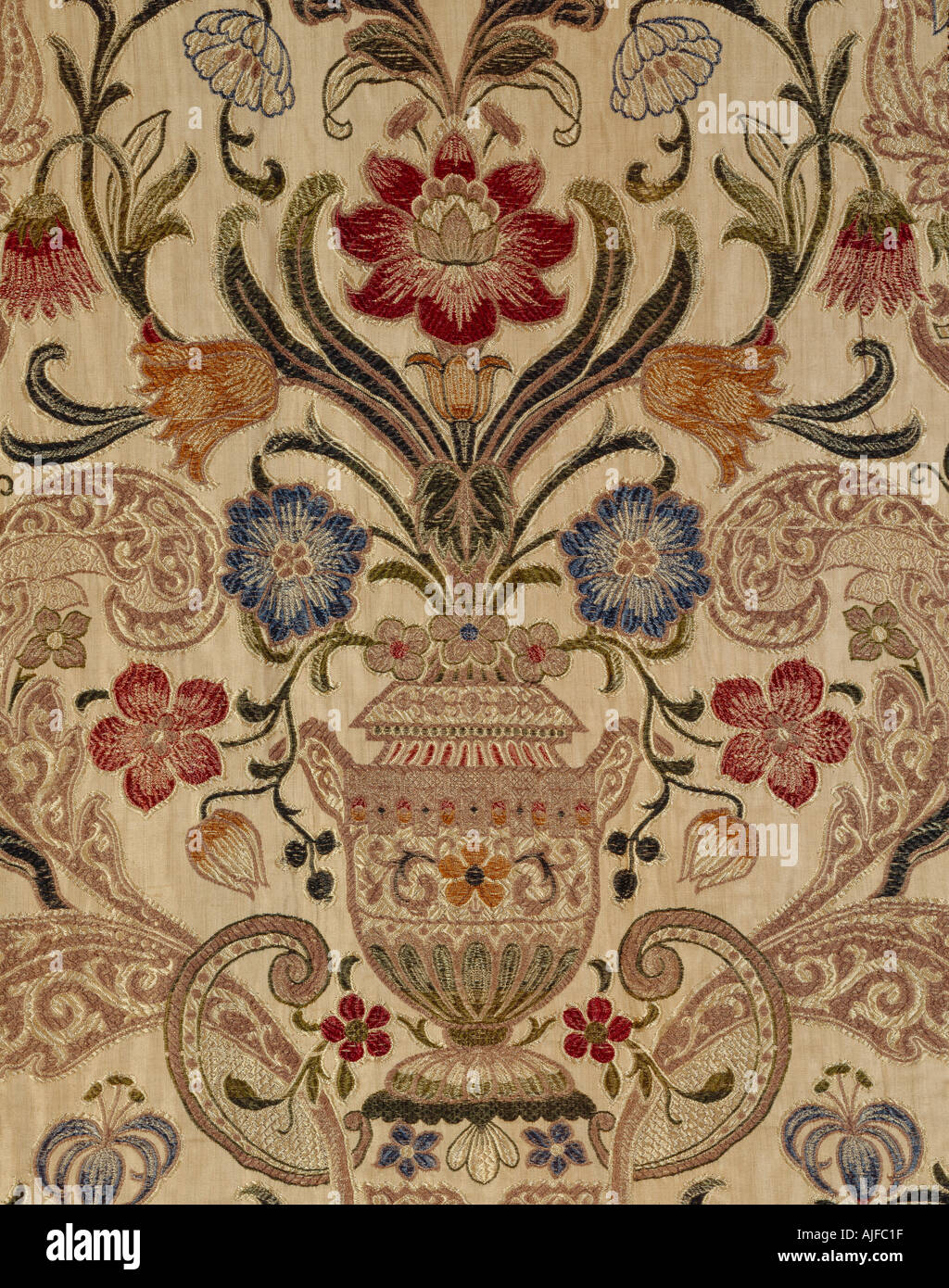 The floral design on the brocaded bed hangings in the Gallery Bedroom at Powis Castle Gwynedd Wales Stock Photo