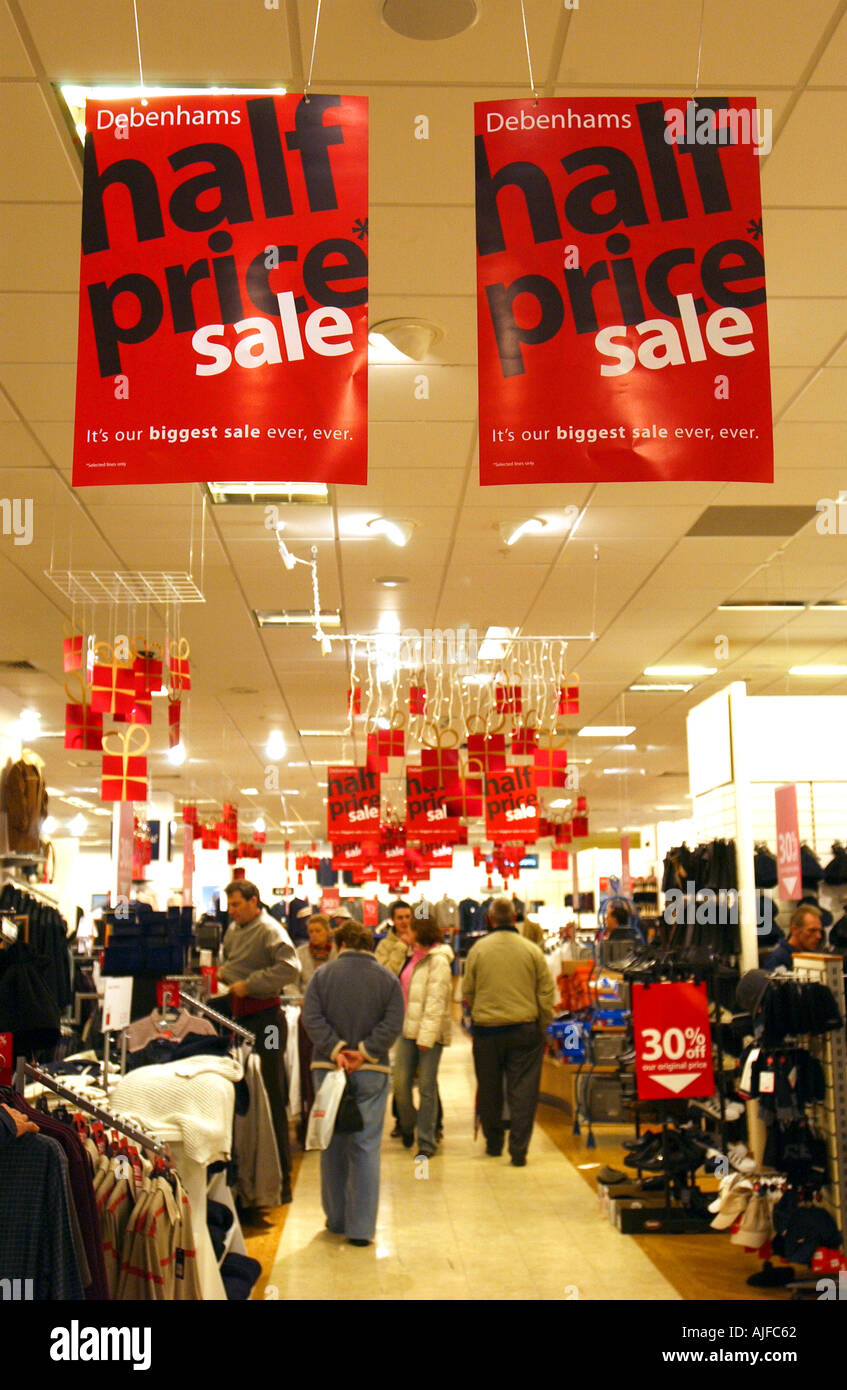 Sales posters in a department store in England UK Stock Photo Alamy