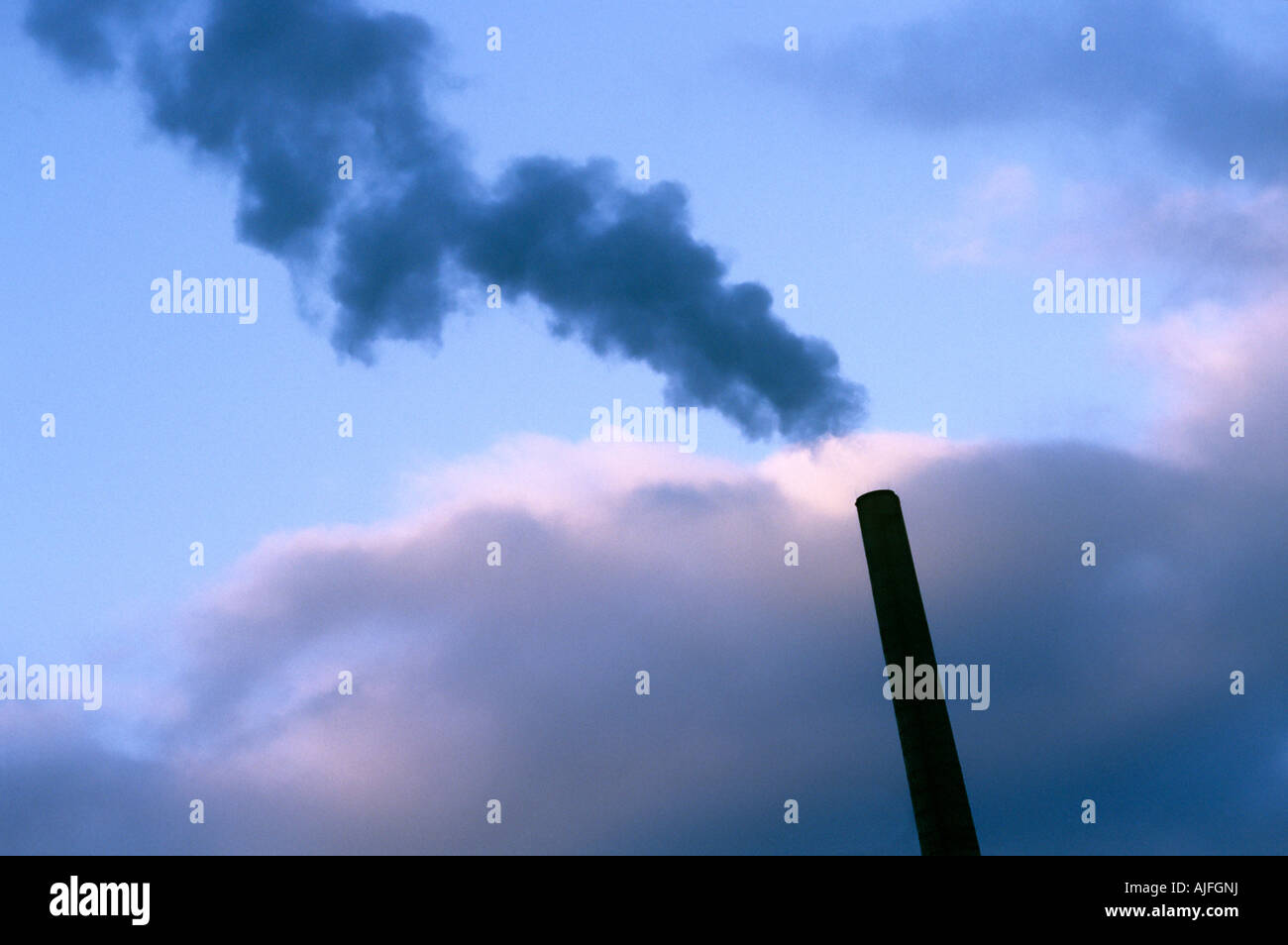 Smoke coming out of a chimney Stock Photo Alamy