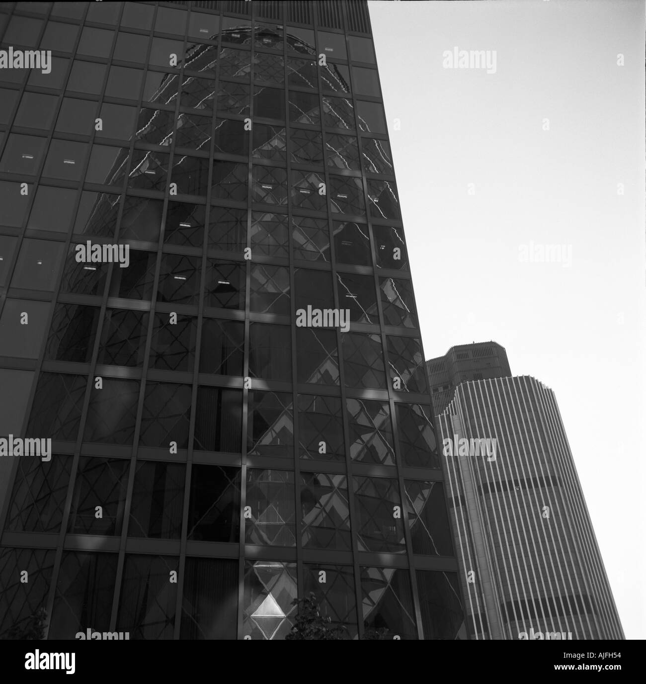 The Gherkin reflected in another building Stock Photo - Alamy