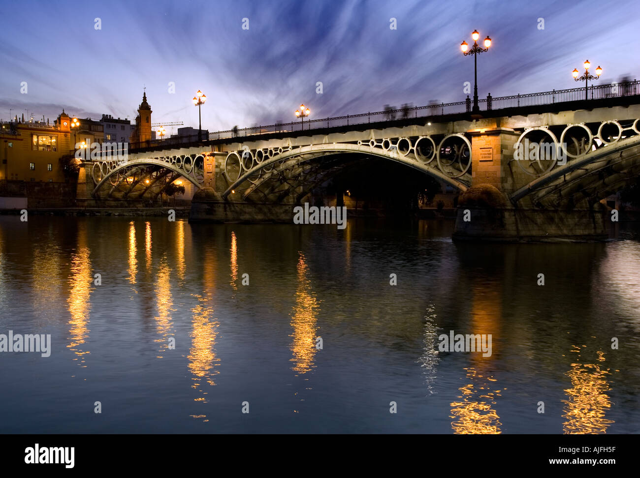 Triana bridge dusk seville hi-res stock photography and images - Alamy