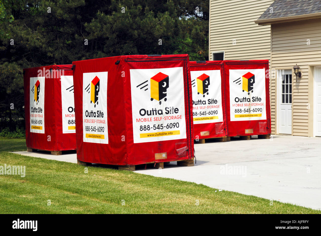 Delivered storage boxes outside a house ready for the new owners to