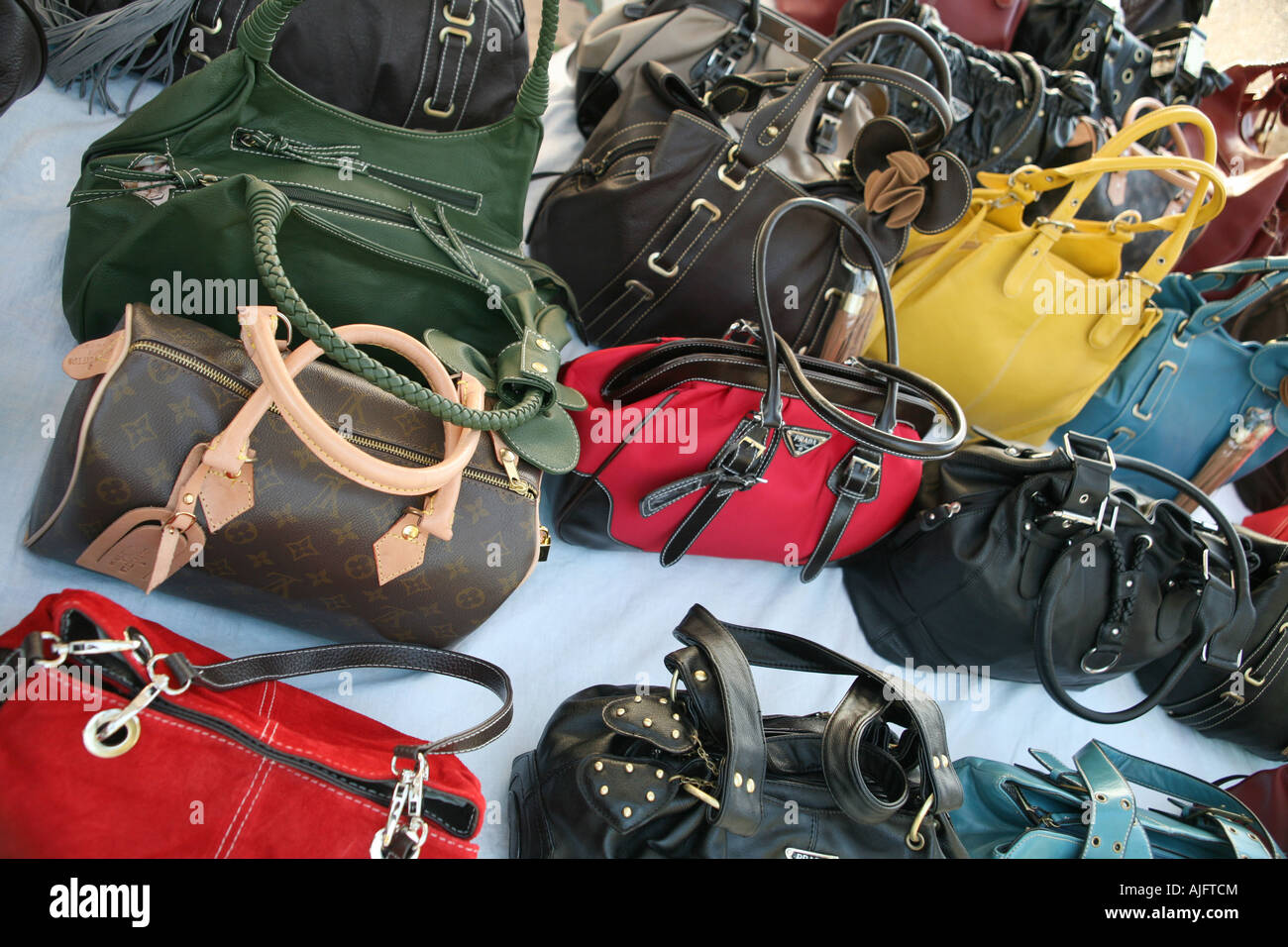 Counterfeit designer bags on sale in Alghero, Sardinia, Italy Stock Photo -  Alamy