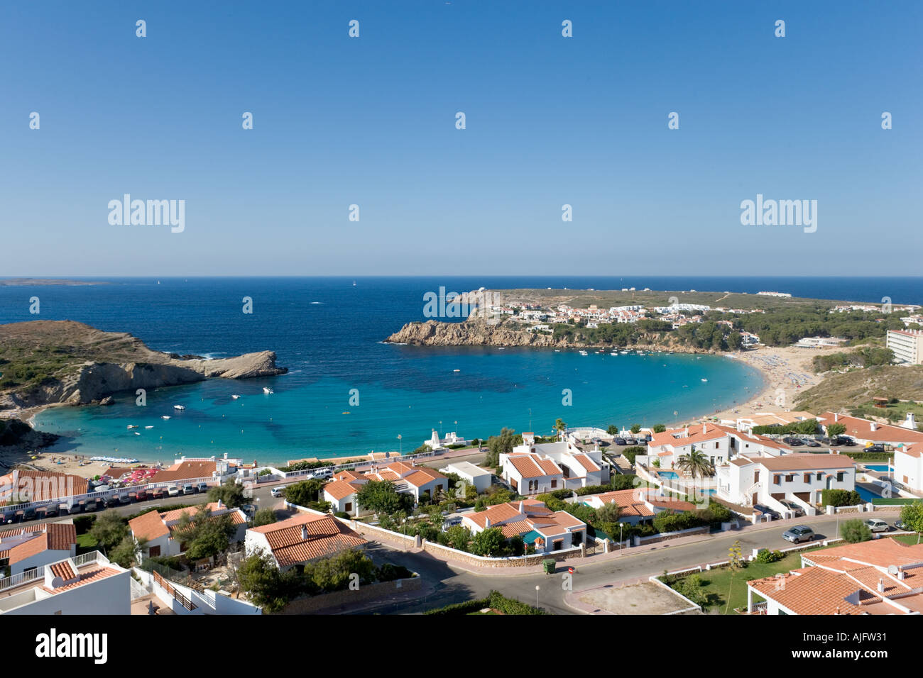 Modern development and beach at Arenal d'en Castell, Menorca, Spain Stock Photo