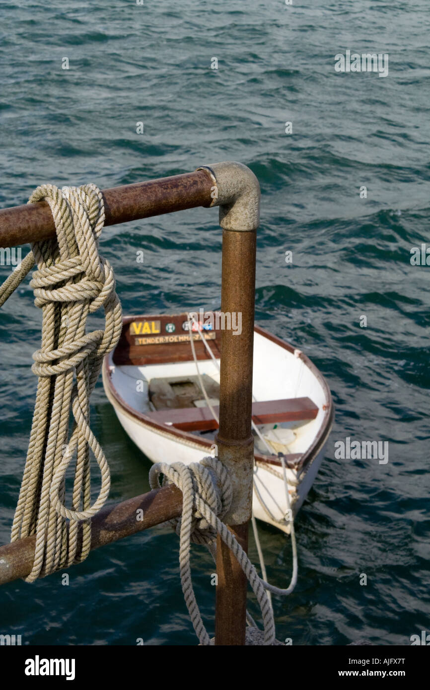 Boat mooring and dinghy Stock Photo Alamy