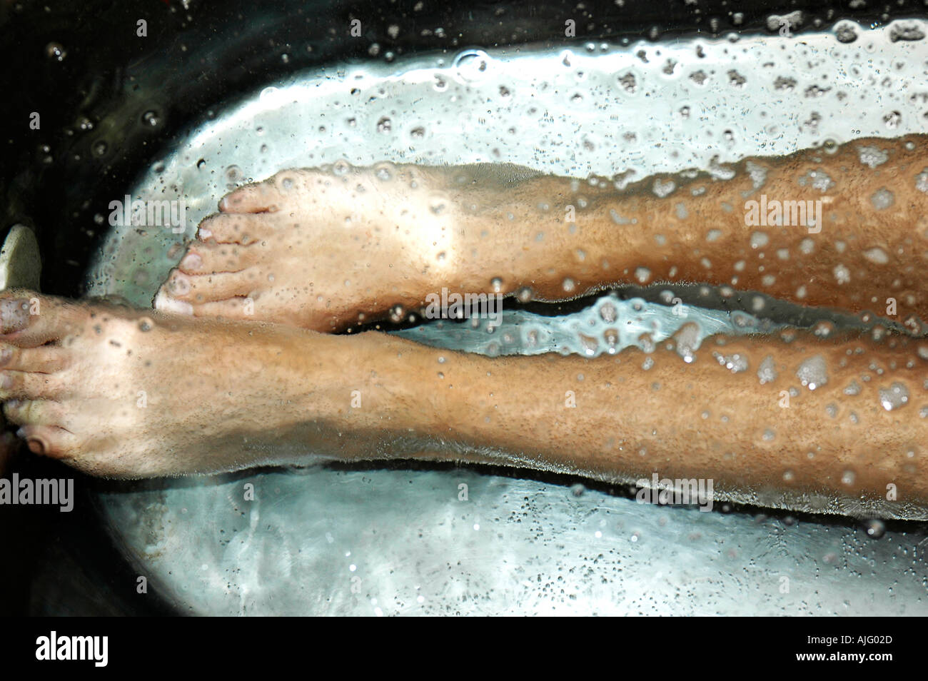detail of feet relaxing in the bath at spa Stock Photo - Alamy