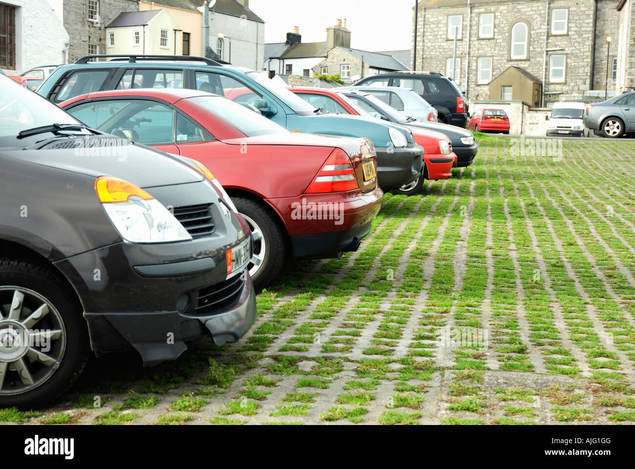 Car park on concrete and grass Stock Photo Alamy