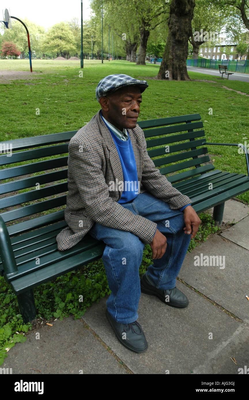 Lonely man sitting hi-res stock photography and images - Alamy