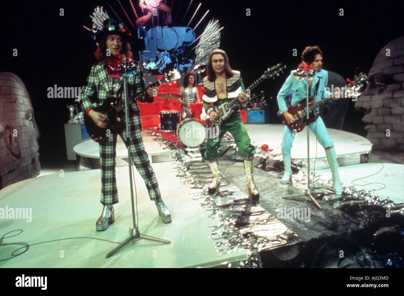 SLADE UK group on a Dutch TV show about 1973 From left Noddy Holder Don Powell on drums Dave Hill and Jimmy Lea Stock Photo