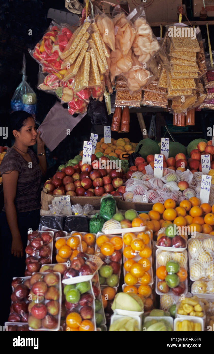 Malay market food fruit vegetables stall stallholder colourful bright ...