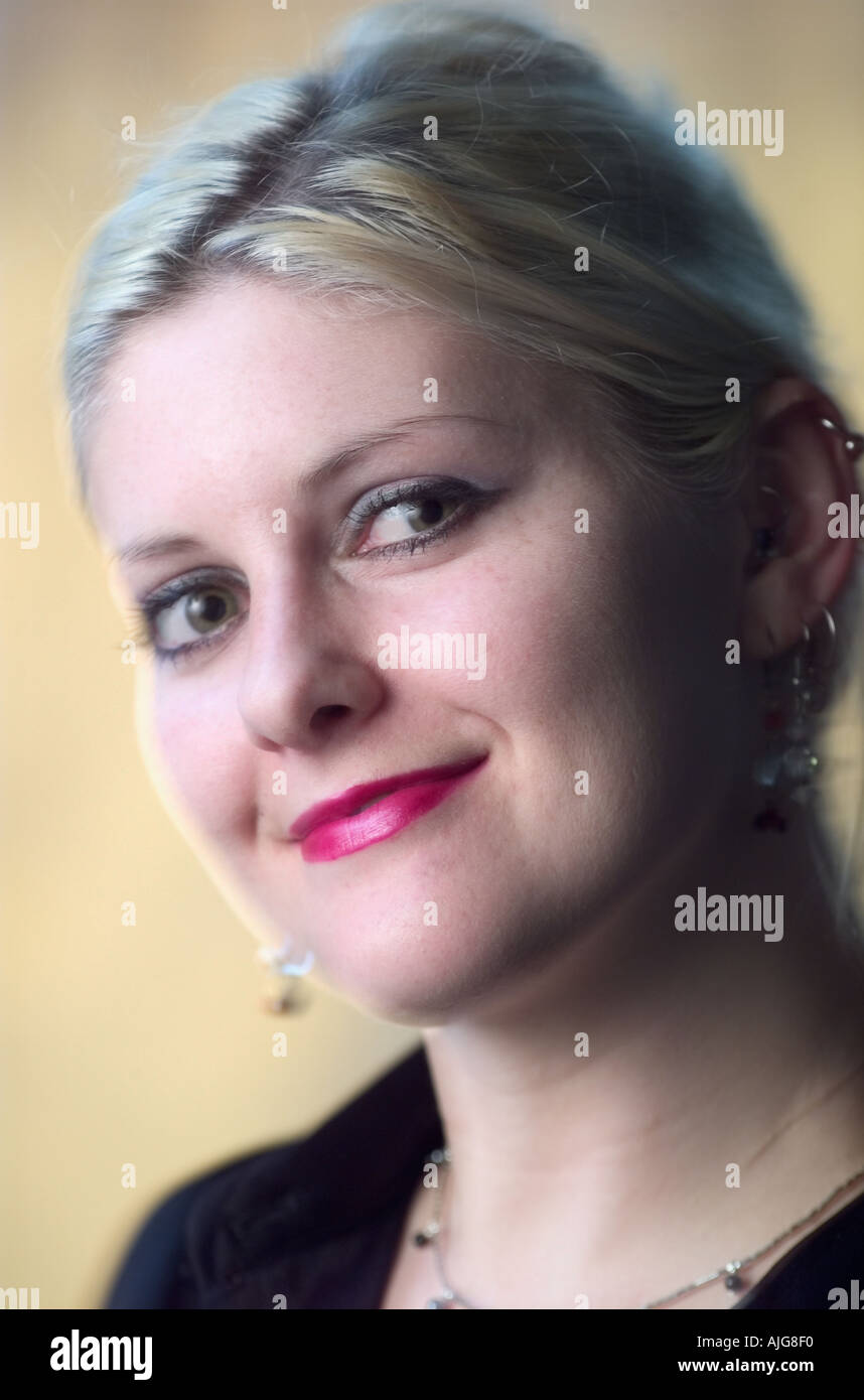Portrait of young Caucasian woman smiling Stock Photo
