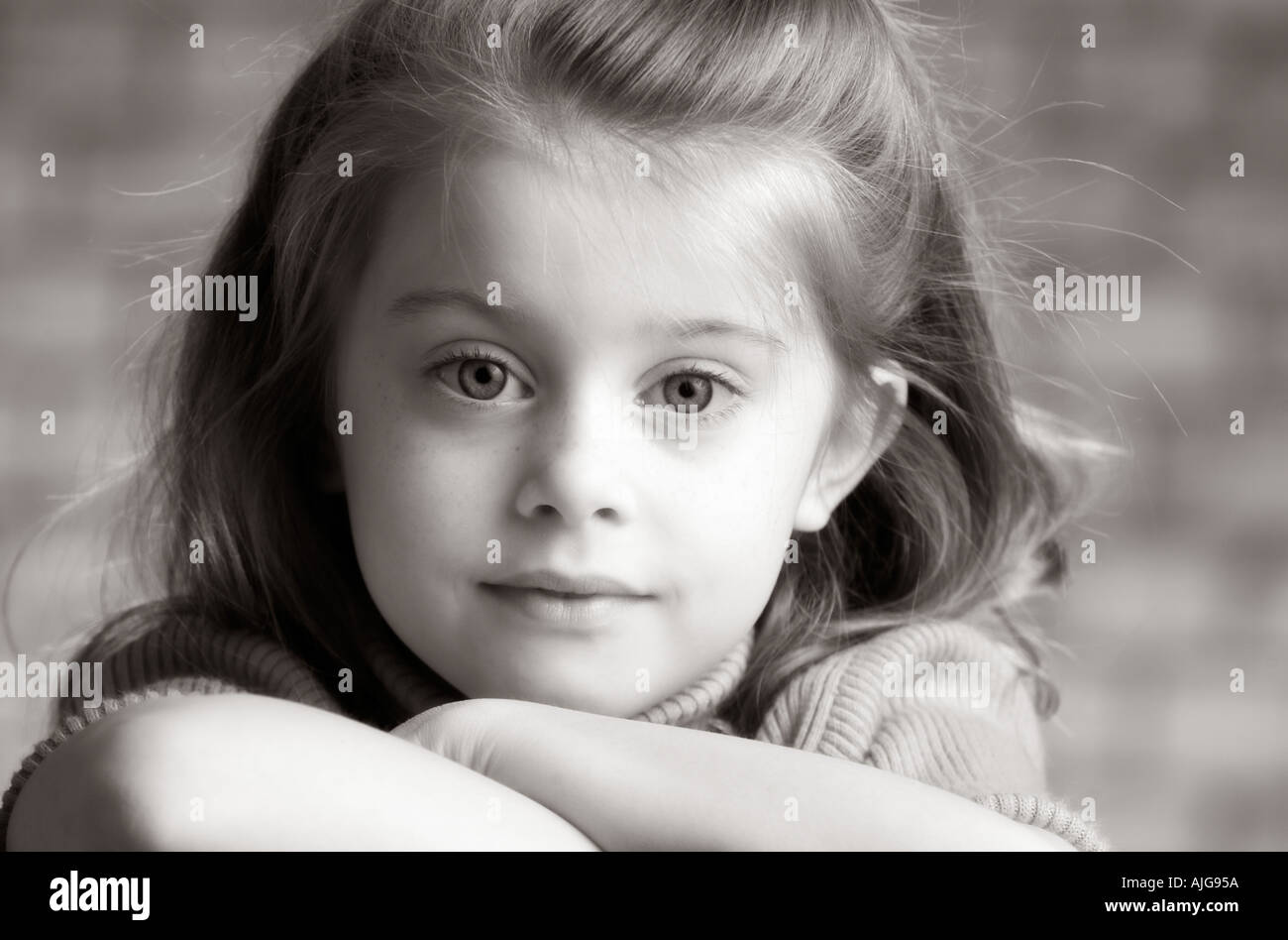 Black-and-white portrait of an Aaluring Caucasian little girl Stock Photo