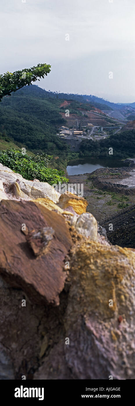 From gold ore body in foreground to underground pit head in background, Ghana, West Africa Stock Photo
