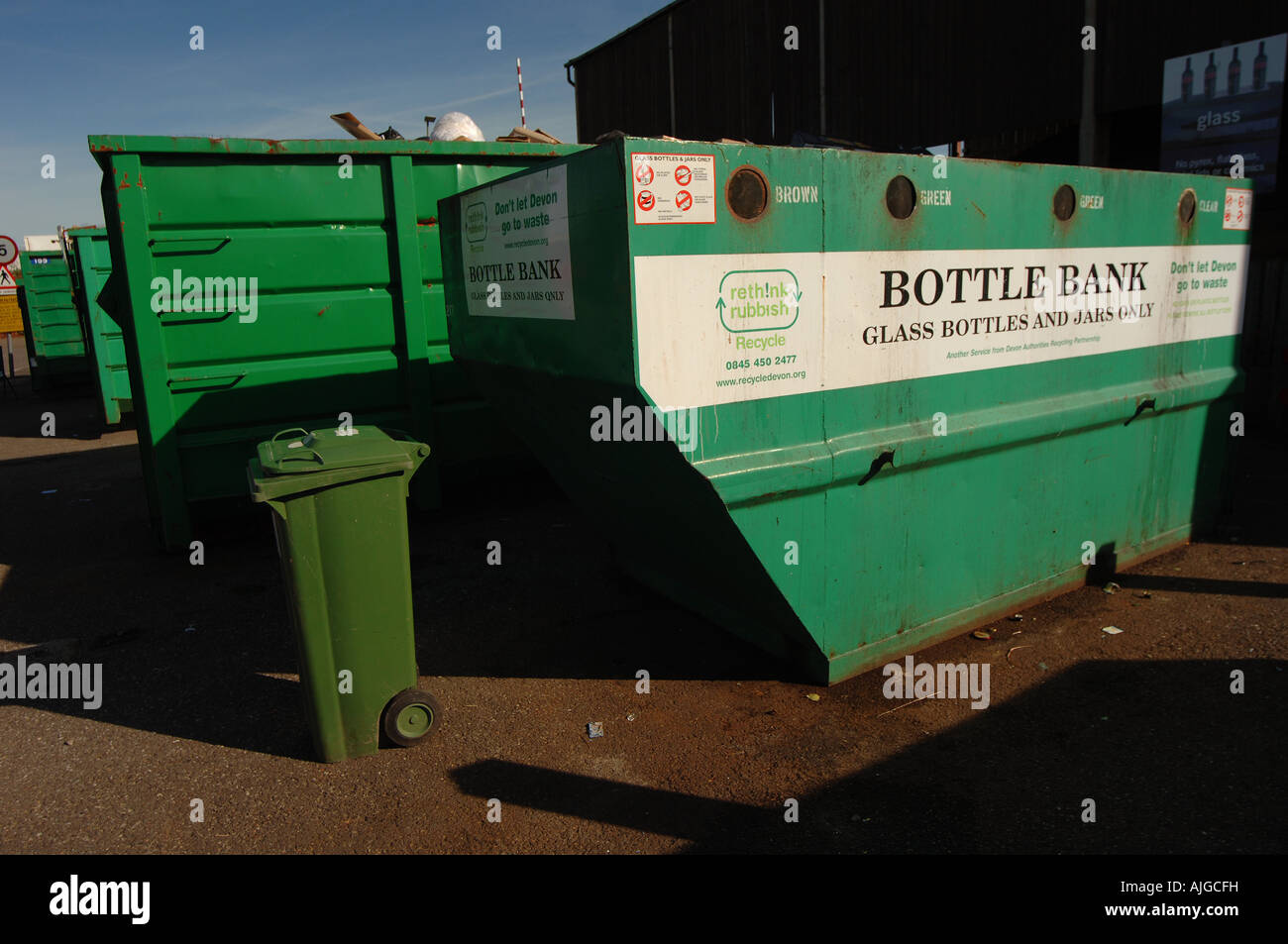 A bottle bank at a recycling centre in Exeter, Devon, UK Stock Photo